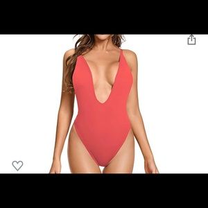 One piece red low v-cut bathing suit